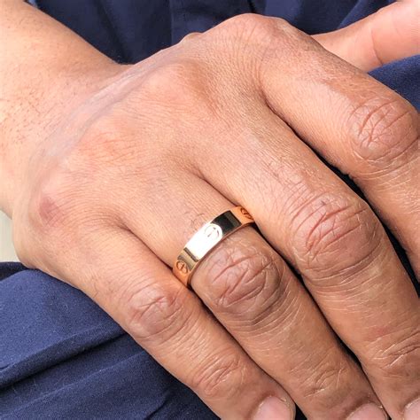 men's cartier ring with diamond.